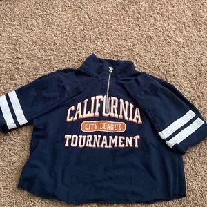 blue cropped half way zip up hoodie